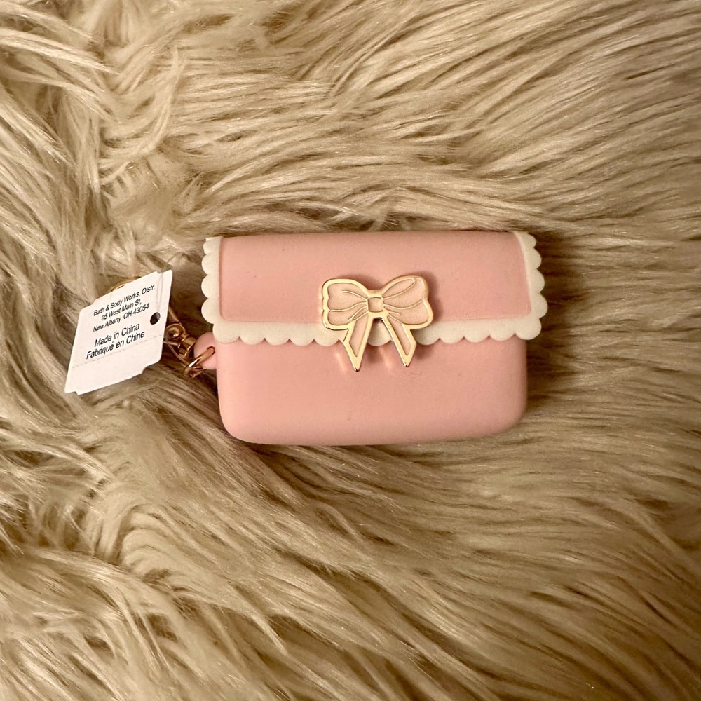 Bath and body bow hand sanitizer holder